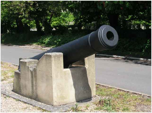 Cannon outside Church